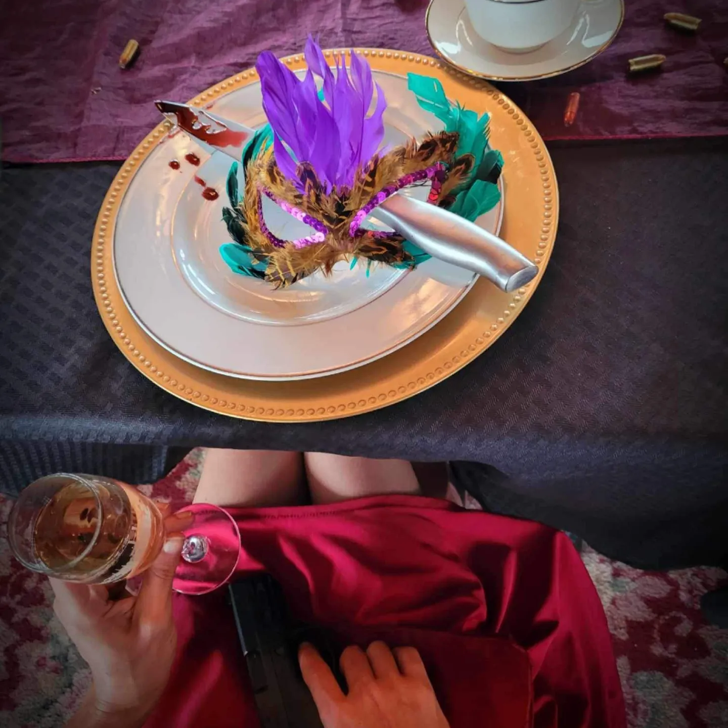 a person sitting at a table with a cake on a plate