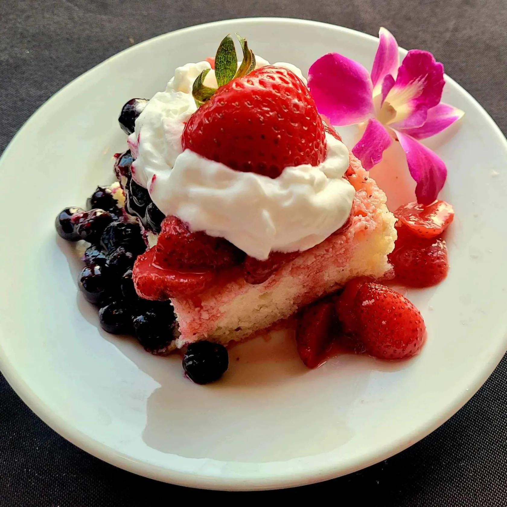 a cake with a dessert on a plate