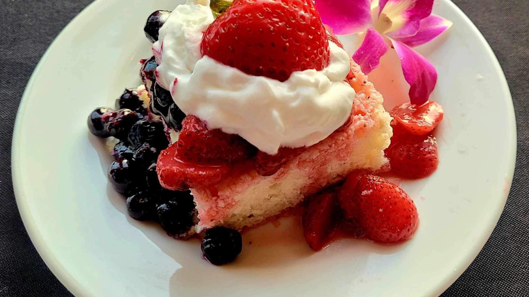 a cake with a dessert on a plate