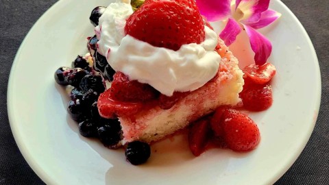 a cake with a dessert on a plate