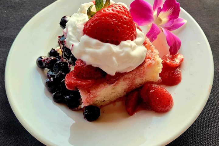 a cake with a dessert on a plate