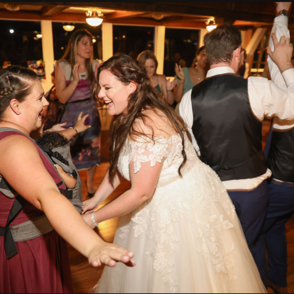 a group of people standing in front of a crowd