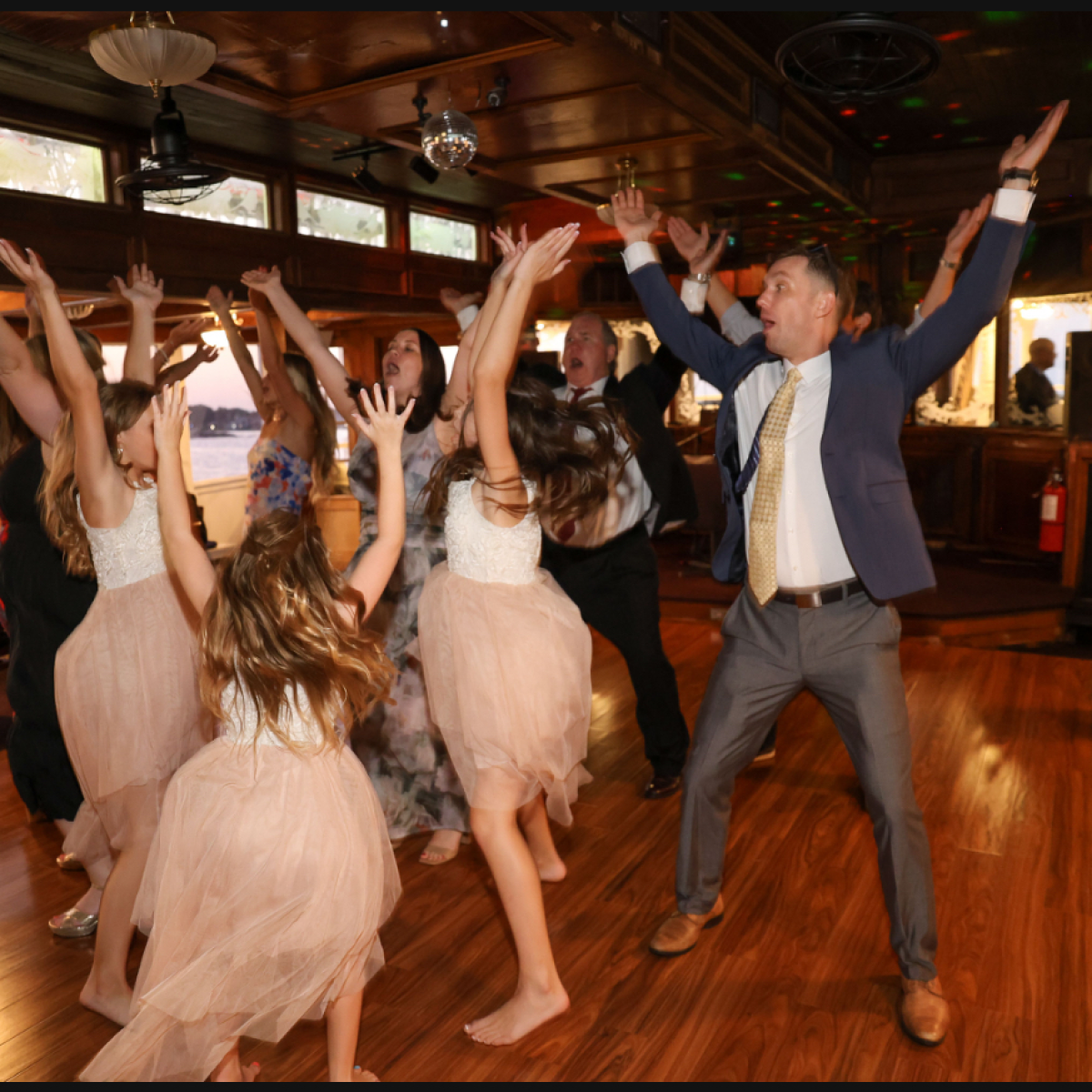 a group of people standing in a room