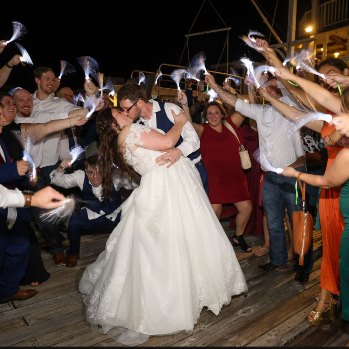 a group of people standing in front of a crowd