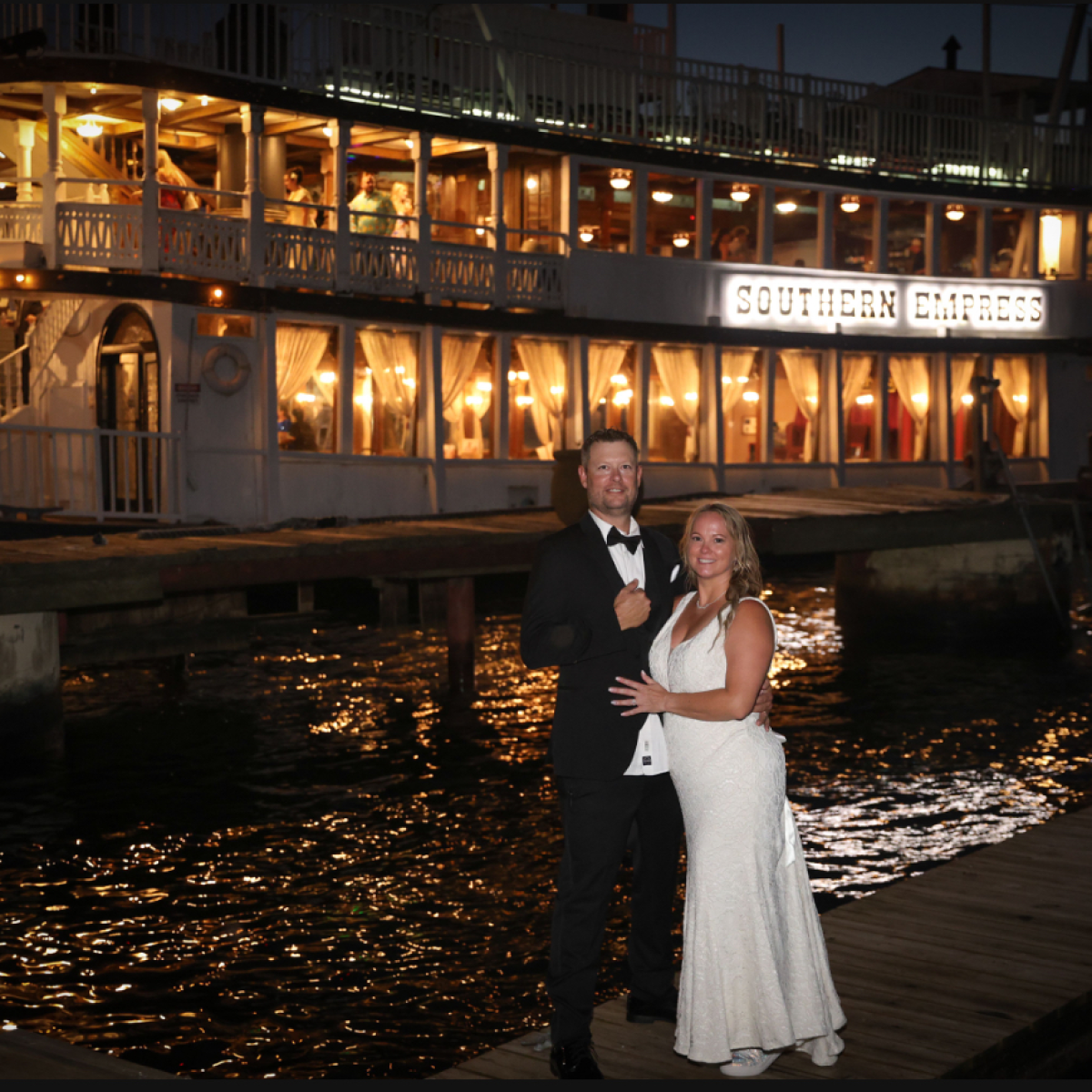 a person standing in front of a body of water